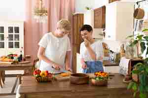 Free photo women cooking with different ingredients