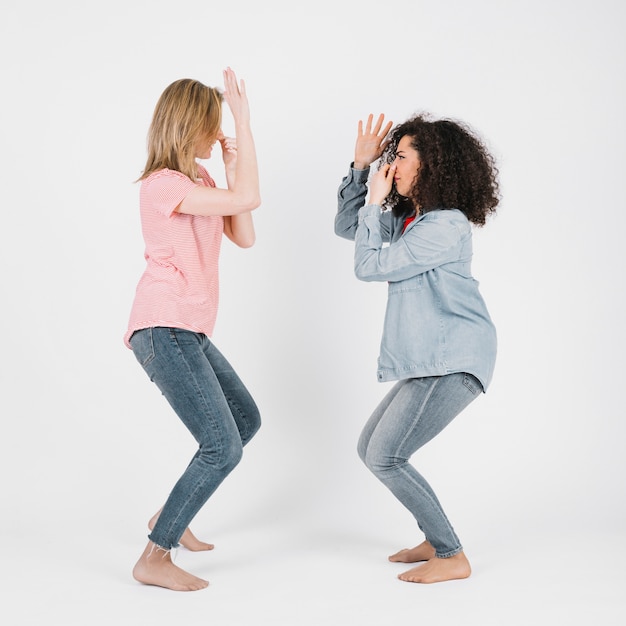 Women doing drowning dance moves