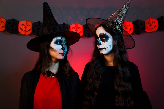 Free photo women dressed as witches