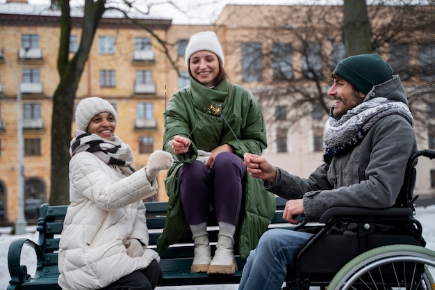 Women enjoying time with their friend in wheelchair