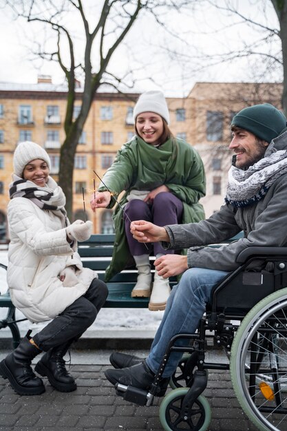 Women enjoying time with their friend in wheelchair