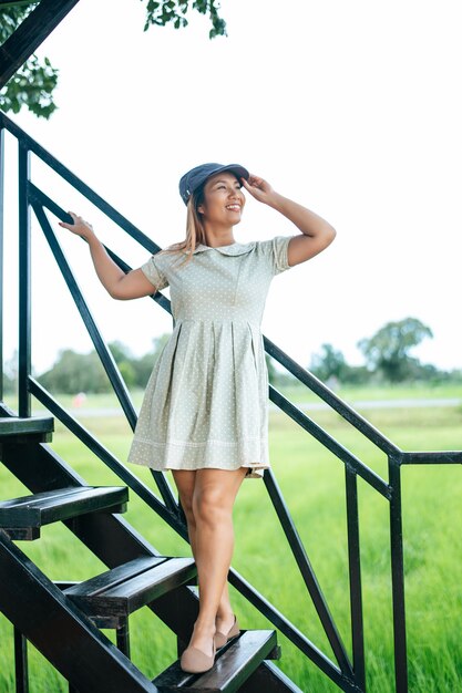 women happily stood the stairs in the tourist sites