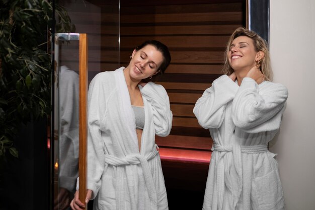 Women having beauty treatment at sauna