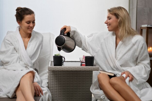 Women having beauty treatment at sauna