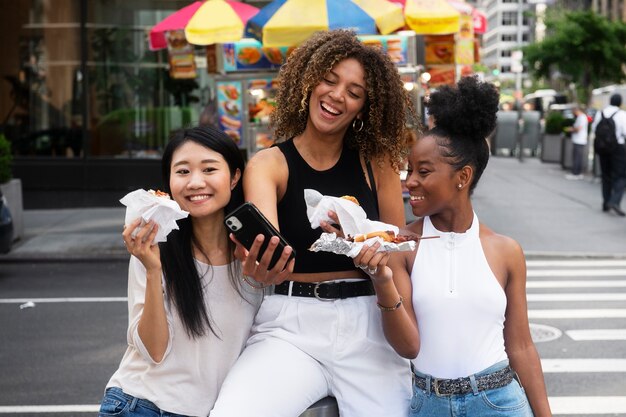 Women having fun at food festival