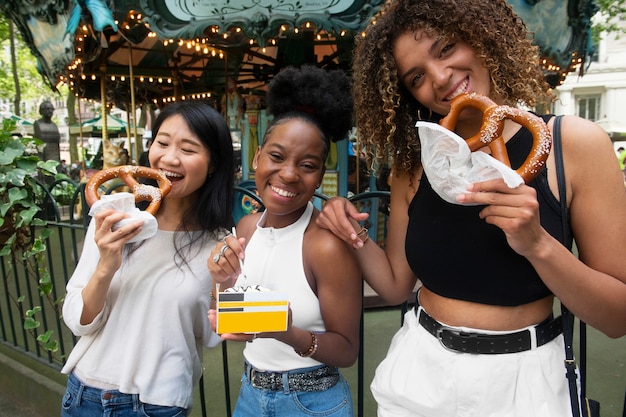 Women having fun at food festival