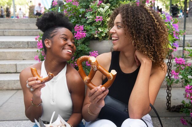 Women having fun at food festival