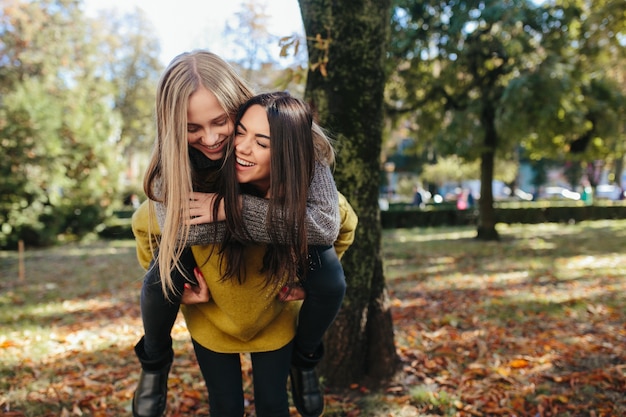 Women having fun in park