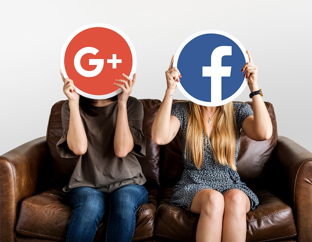 Free photo women holding social media icons