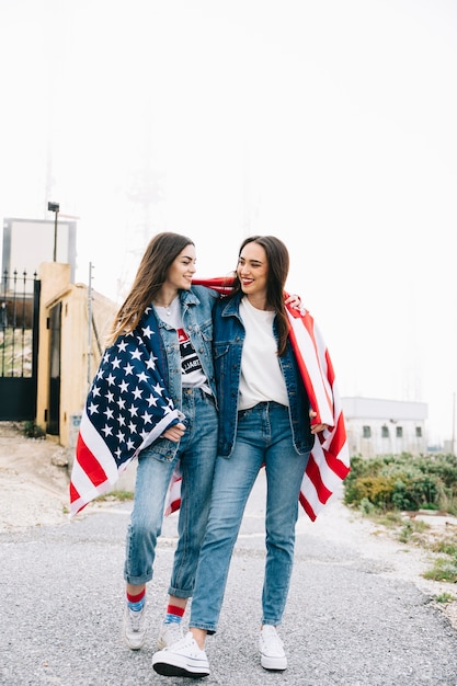 Women hugging on 4th of July