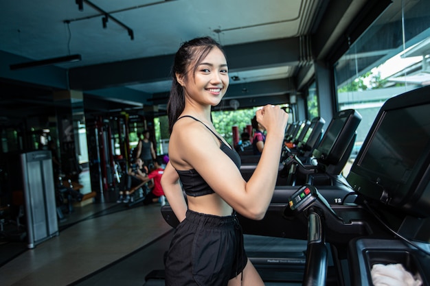 Women jogging on the treadmill in the gym