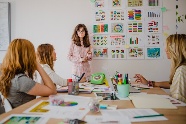 Women looking at diagrams