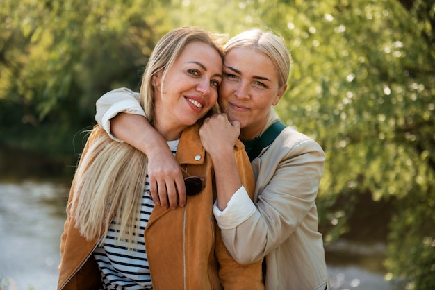 Women posing together medium shot