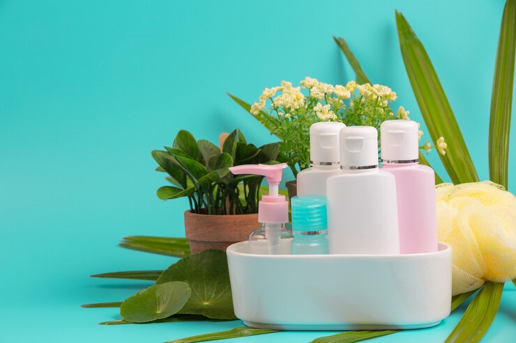 Free Photo women's cosmetic products placed on a blue .