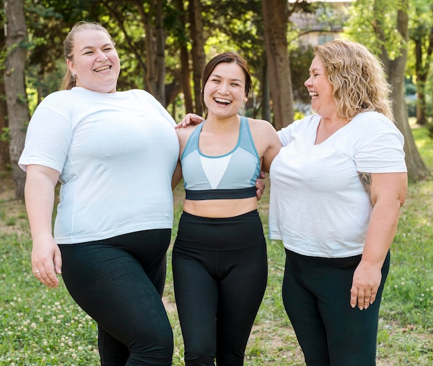 Free photo women in sport wear laughing front view