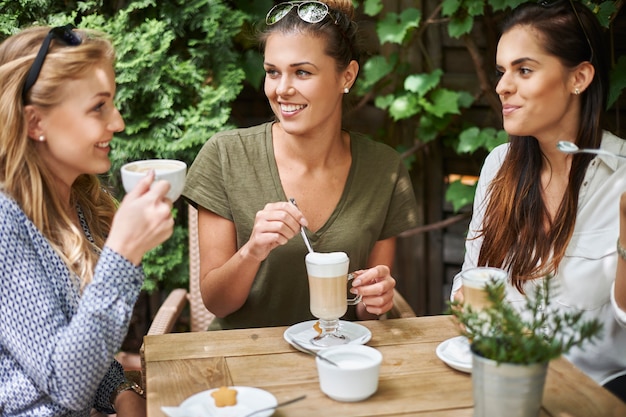Women taking a coffee with friends