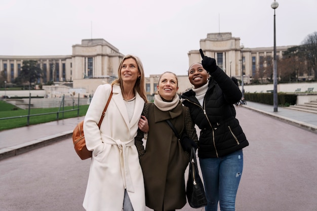 Free photo women traveling in paris