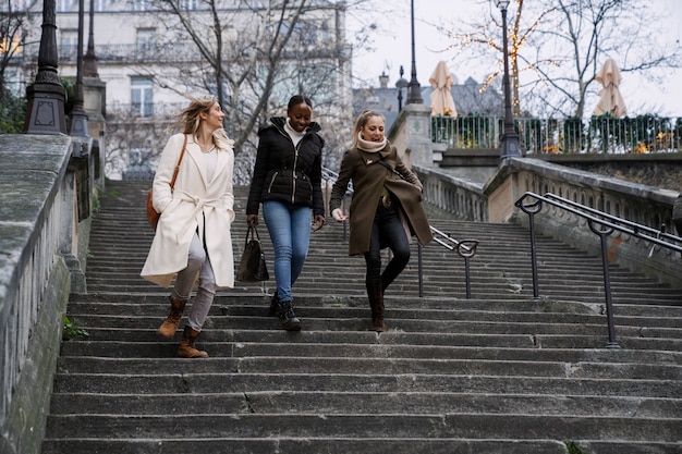 Free photo women traveling in paris