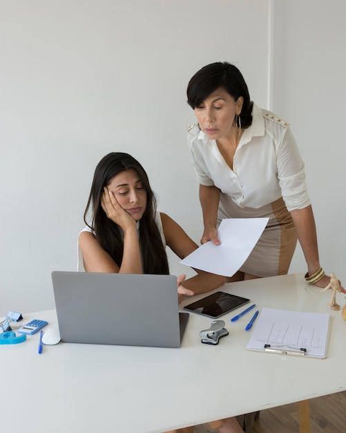 Women trying to solve a project problem