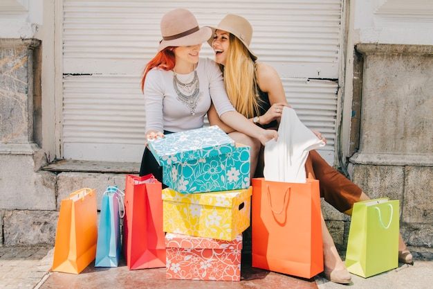 Women with boxes and bags