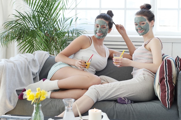 Women with facial mask, beauty and skin care concept