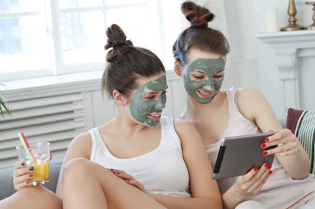 Women with facial mask, beauty and skin care concept