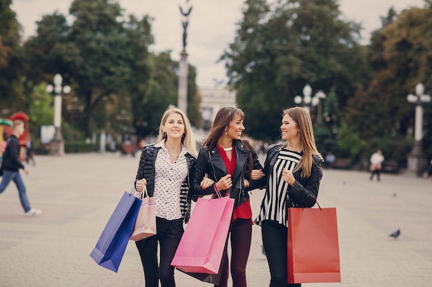 Women with purchase bags