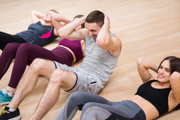 Women working out with the trainer