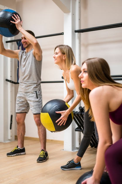 Women working out with trainer