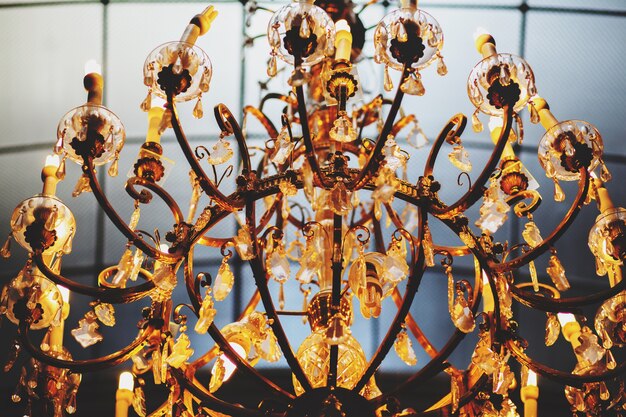 A wonderful old gold vintage chandelier decorated with crystals 