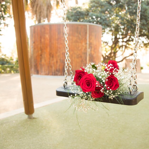 Wonderful romantic bouquet on swings