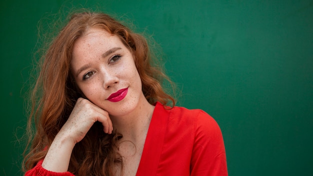 Wonderful woman posing on green background