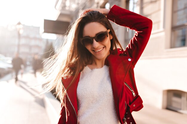 Wonderful young woman in casual jacket expressing good emotions