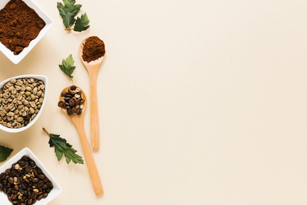 Free photo wood spoons with coffee and copy space