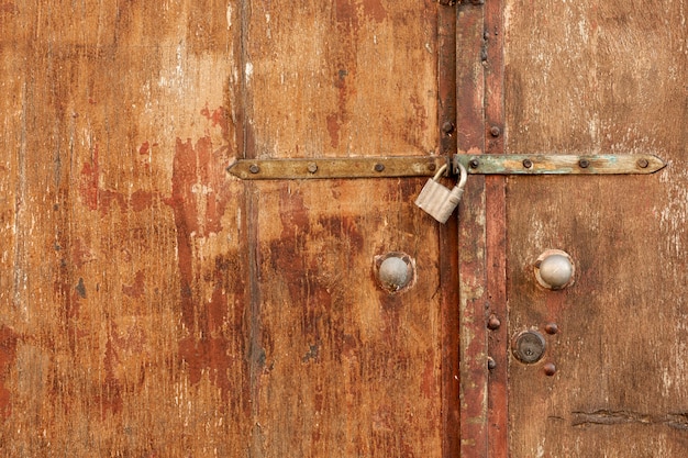 Wood surface with rusty retro lock