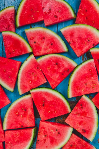 Wood surface with watermelon portions