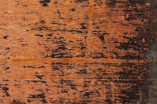 Wood with worn surface and holes