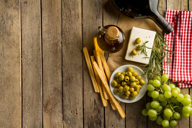 Wooden background with tasty products