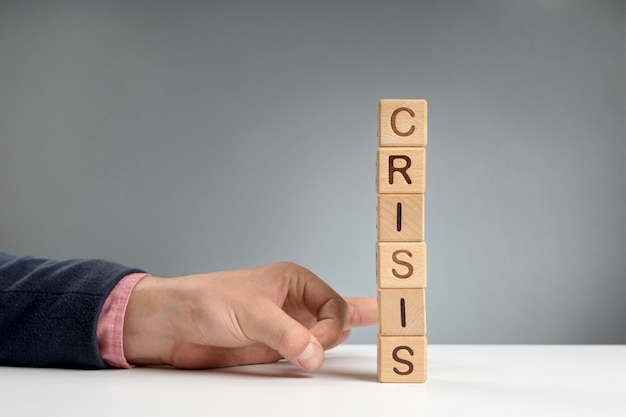 Wooden blocks with crisis mesage