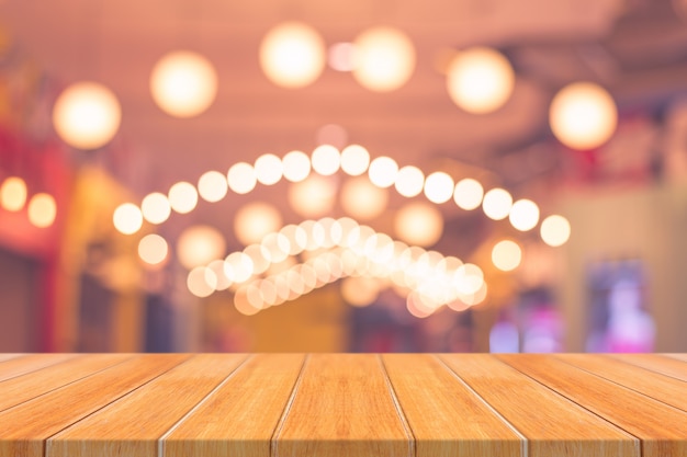 Wooden board empty table top on of blurred background