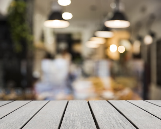 Wooden board looking out to blurred bar