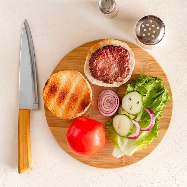 Wooden board with hamburger