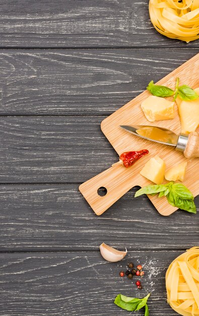 Wooden board with ingredients for noodles