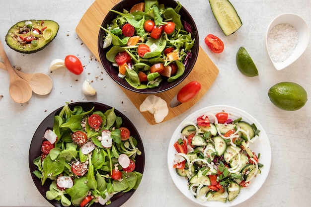 Wooden board with salad