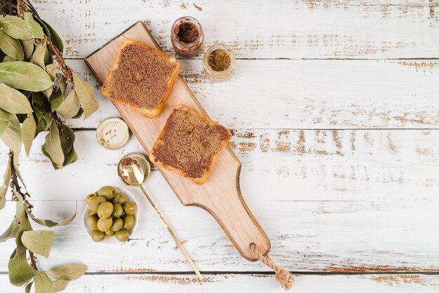 Wooden board with sandwiches