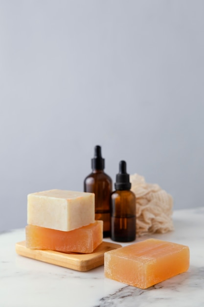 Wooden board with soap and serum