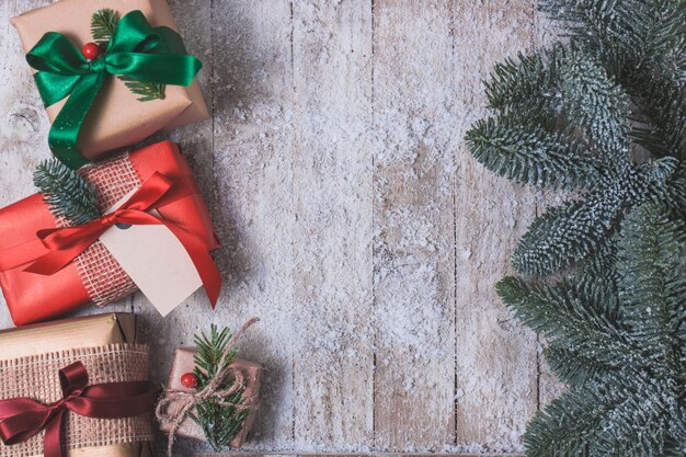 Wooden boards with gifts on one side