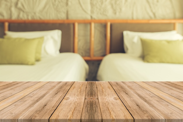 Free photo wooden boards with two bed background