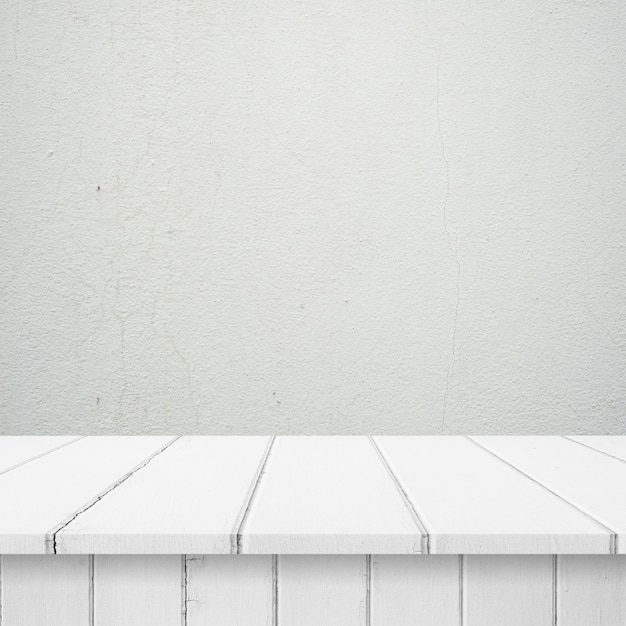 Free photo wooden boards with a white wall