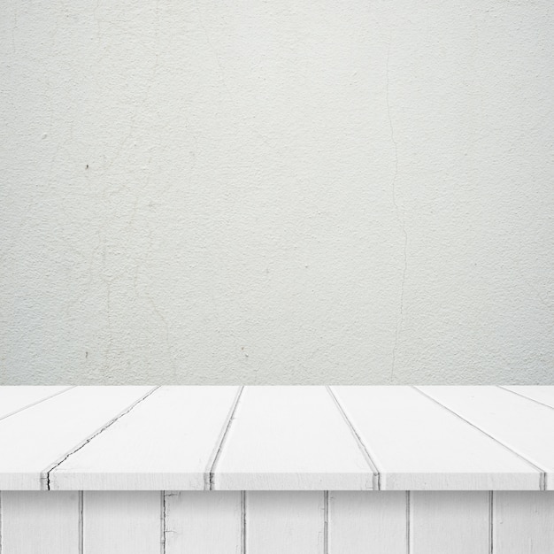 Wooden boards with a white wall